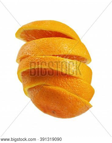 Flyin Pieces Of A Sliced Orange Isolated On White Background