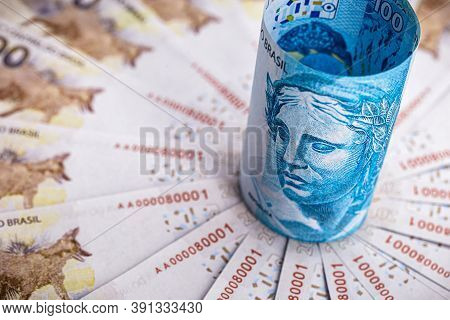 100 Reais Banknote And 200 Reais Banknotes, Money From Brazil, Conceptual Image For The Economy Of B