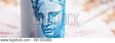 100 Reais Banknote And 200 Reais Banknotes, Money From Brazil, Conceptual Image For The Economy Of B
