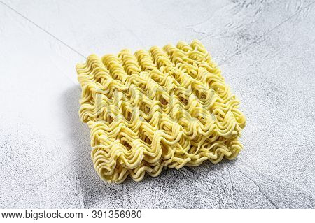 Dry, Raw Quick Cooking Noodle, Instant Noodles. White Background. Top View