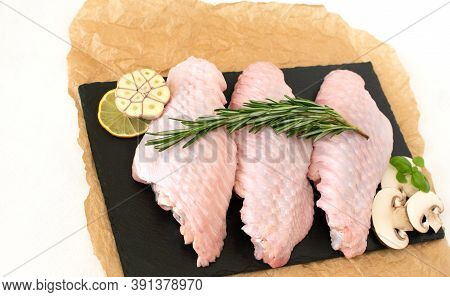 Raw Parts Of Turkey Wing, Three Pieces Of Chicken