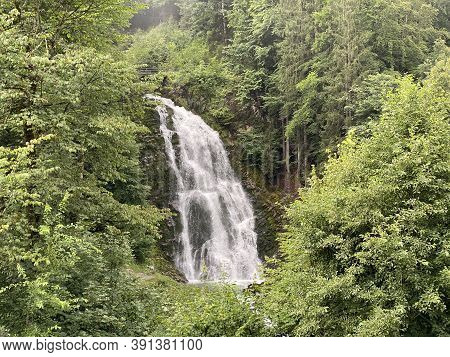 Giessbach Falls In The Eponymous Nature Park And Over Lake Brienz - Canton Of Bern, Switzerland