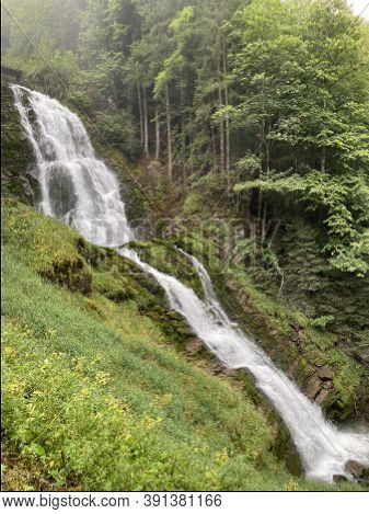 Giessbach Falls In The Eponymous Nature Park And Over Lake Brienz - Canton Of Bern, Switzerland