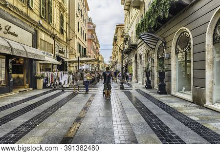 Sanremo, Italy - August 18: Walking In The Centre Of Sanremo, Italy, On August 18, 2019. The City Ho