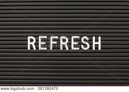 Black Color Felt Letter Board With White Alphabet In Word Refresh Background