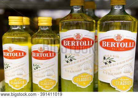 Tyumen, Russia-october 11, 2020: Bertolli Olive Oil In Bottle Sell In Supermarket. Bertolli Is An It
