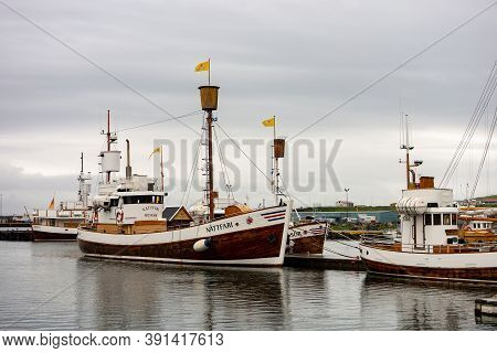 Husavik, Iceland, July 4, 2014: Historical Wooden Nattfari Whale Watching Vessel In The Harbour In H