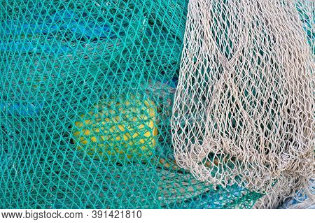 View On Fishermans Tackles And Nets Near Coastal Town Terracina, Latina, Italy On Sunset