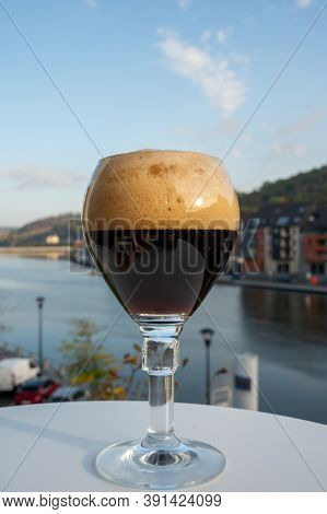 Pouring Of Belgian Abbey Beer And Tasting Of Cheeses Made With Trappist Beer And Fine Herbs With Vie