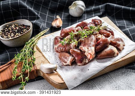 Fresh Chicken Hearts. Raw Offals. White Background. Top View