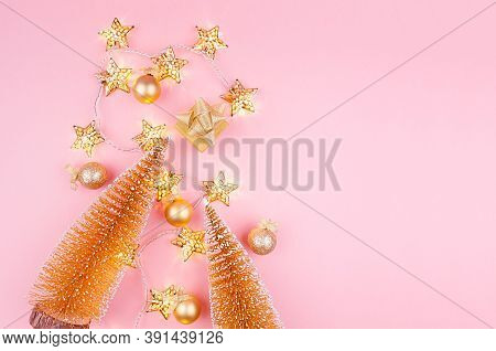 Christmas Background In Gold Glitter Color - Christmas Trees, Balls, Gift Box And Glowing Stars Ligh