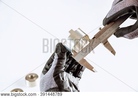 Measuring Inner Diameter, Outer Diameter, Length With A Caliper On A White Background.