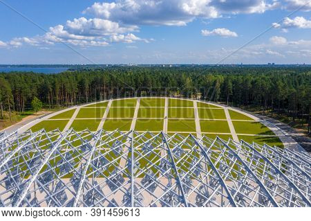 Riga, Latvia. August 10, 2020. Beautiful New Stadium Located In The Middle Of A Forest. Aerial View 