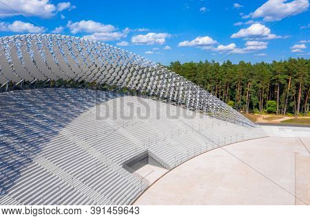 Riga, Latvia. August 10, 2020. Beautiful New Stadium Located In The Middle Of A Forest. Aerial View 