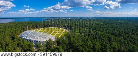 Riga, Latvia. August 10, 2020. Beautiful New Stadium Located In The Middle Of A Forest. Aerial View 