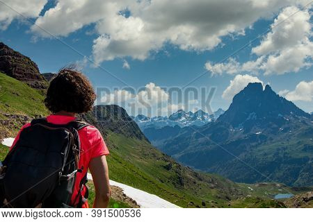 Hiking Woman Looking A Pic Du Midi Ossau In The French Pyrenees Mountains