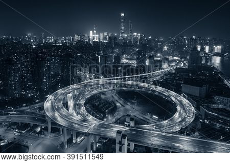 Shanghai Nanpu Bridge over Huangpu River with busy traffic in China.