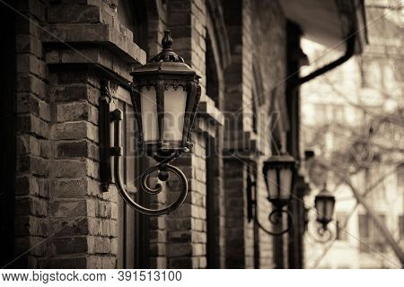 Road lamp and wall window patterns in Xiahao Old street in Chongqing, China.