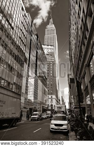 New York City - SEP 11: Empire State Building viewed from street on September 11, 2015 in New York City. With 8.5M, New York City is the is the most populous city in the United States.