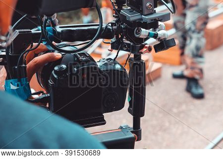 Behind The Scene. Cameraman Shooting Film Scene With Camera