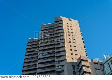 Madrid, Spain - 3rd October, 2020: The Tower Of Valencia Skyscraper Against Blue Sky. It Was Designe
