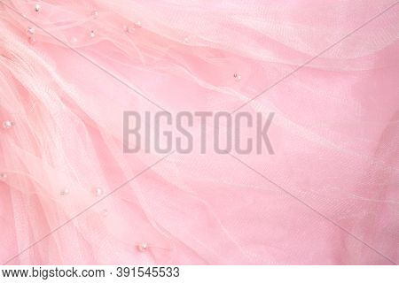 Beautiful Bright Pink Tulle With Shiny Beads Background. Draped Background Of Pink Powdery Fabric, T