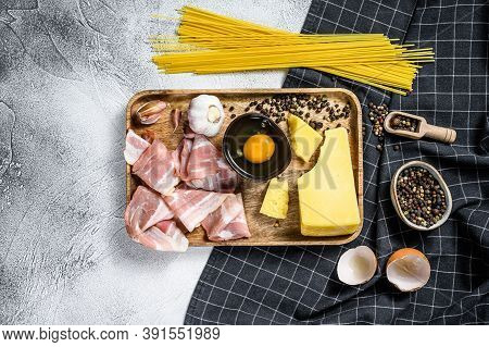 Traidtional Italian Pasta Carbonara Ingredients. Bacon, Spaghetti, Parmesan And Pecorino Cheese, Egg