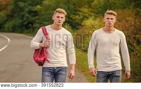 Total Stranger. Man Casual Style Travel With Backpack. Traveler Hitchhiking On Highway. On Way Home.