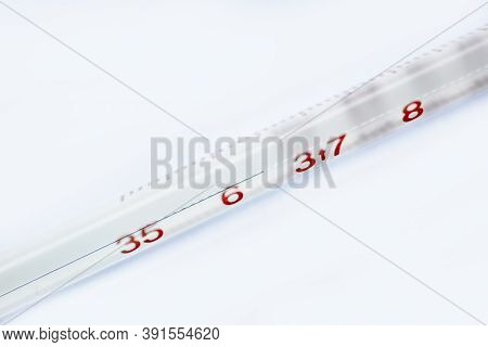 The Close-up Thermometer Isolated On White Background.