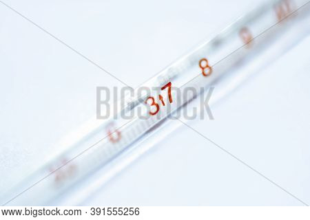 The Close-up Thermometer Isolated On White Background.