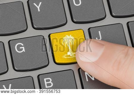 Computer keyboard with palm tree key