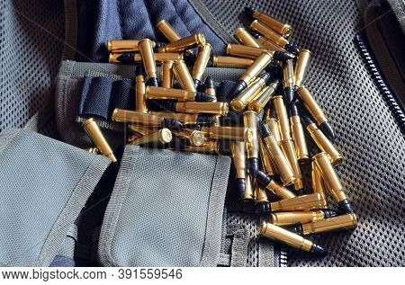 Ammunition 7,62*39.Tactical unloading vest as background. October 23, 2020.Kiev,Ukraine