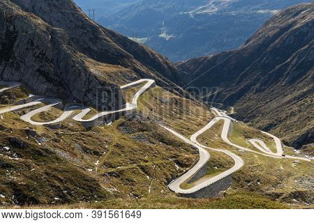 Tremola road on the Gotthard Pass in the Swiss mountains. Sunny day, nobody inside