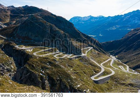 Tremola road on the Gotthard Pass in the Swiss mountains. Sunny day, nobody inside