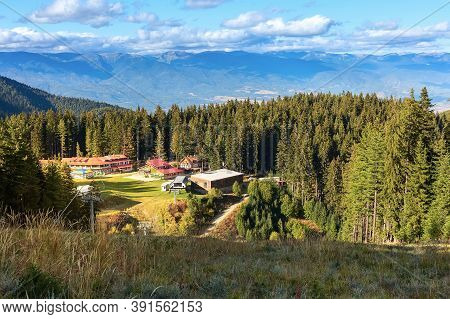 Bansko, Bulgaria Shiligarnika Autumn Ski Resort View With Hotel House, Mountains And Ski Lift