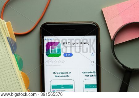 New York, Usa - 26 October 2020: Izz Zorgverzekering Mobile App Logo On Phone Screen Close Up, Illus