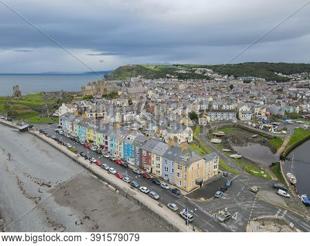 South Beach Promenade At Aberystwyth With The Old Castle