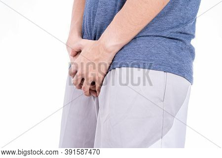 Man Hands Holding His Crotch Isolated White Background. Medical, Healthcare For Advertising Concept.