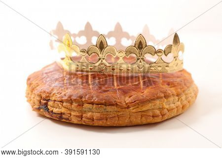 epiphany cake and crown on white background