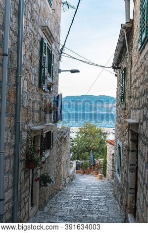 Narrow Old Street In Sutivan Town, Brac, Croatia.