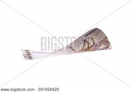 Two Hundred Reais Bill Falling On Isolated Background, New Brazilian Banknote. Wealth, Draw And Prof