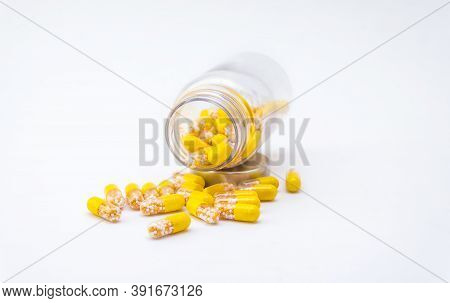 Open Container With Vitamin D3 K2 Capsules Isolated On White Background
