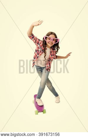Lets Have Fun. Kid Having Fun With Penny Board. Child Smiling Face Stand Skateboard. Penny Board Cut