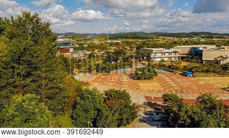 Hampyeong-gun, South Korea; September 27, 2020: Aerial Landscape Of Buildings Near Eco Park Under Cl