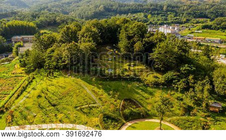 Hampyeong-gun, South Korea; September 27, 2020: Aerial Landscape Of Small Graveyard On Hillside In U