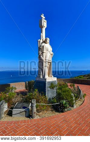 Juan Rodri­guez Cabrillo Statue And Panorama Of San Diego, California