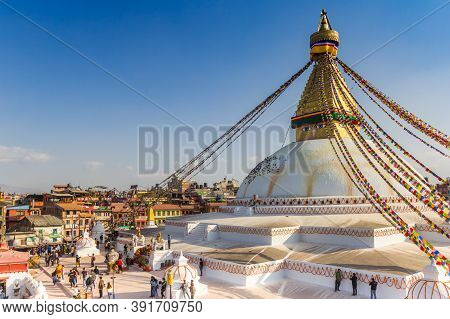 Kathmandu, Nepal - November 14, 2019: Golden Tower On The Boudhanath Stupa In Kathmandu, Nepal