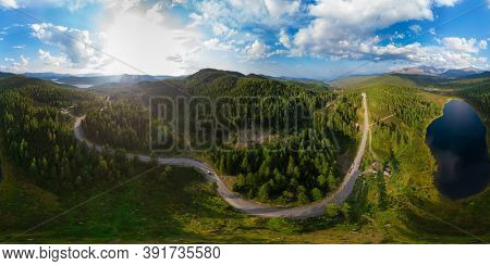 Full 360 equirectangular spherical panorama of the lake of Kidelyu near the Ulagan mountain pass, Altai Republic, Russia. Aerial drone view, virtual reality content.