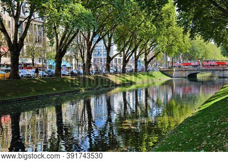 Dusseldorf, Germany - September 19, 2020: People Visit Koenigsallee, Famous Shopping Destination In 