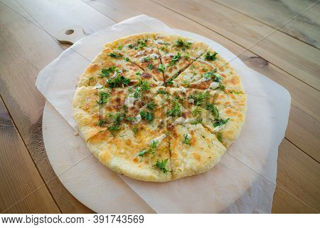 Close Up Pile Of Caucasian Khychin Bread Pie With Stuffing.